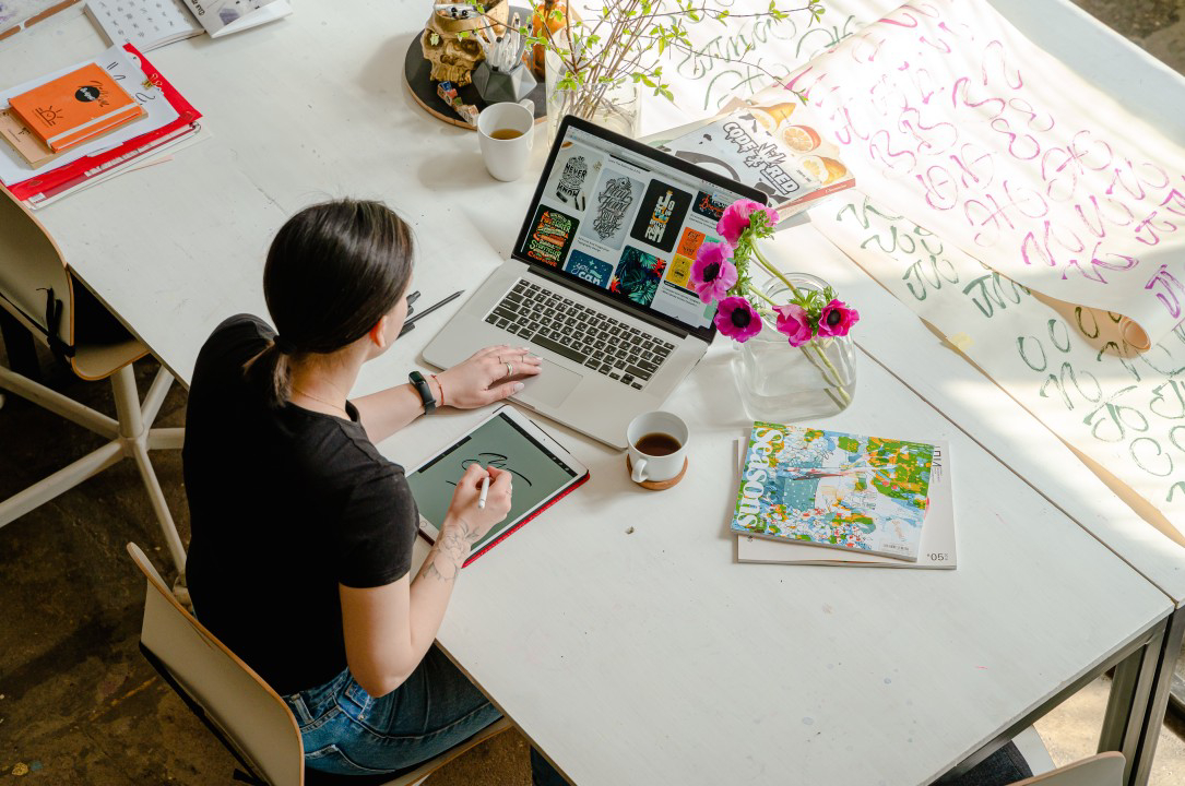 Employee working remotely in an ergonomic home office setup Hybrid work model promoting work-life balance and wellness Tips for maintaining mental health in a hybrid work environment