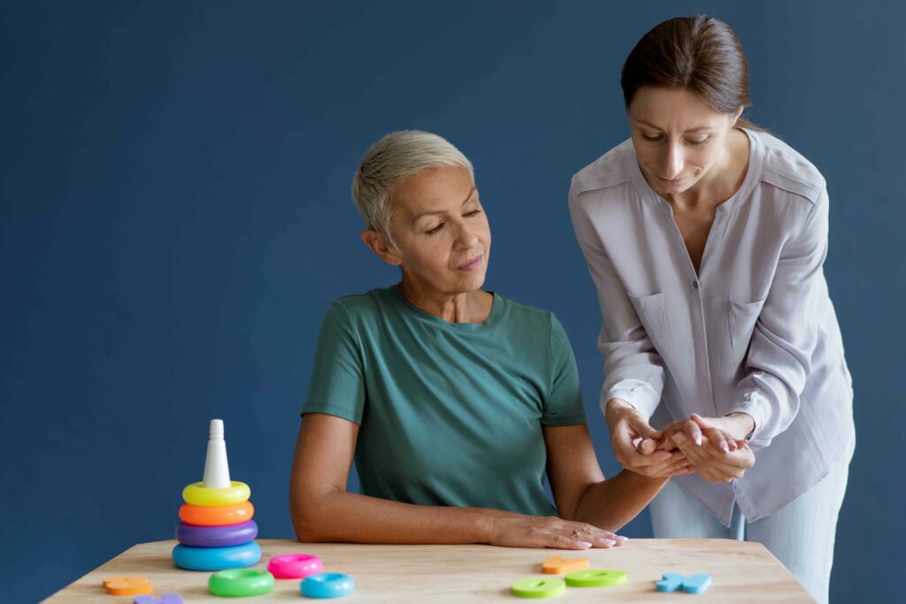 Occupational therapist leading a stress management workshop for employees